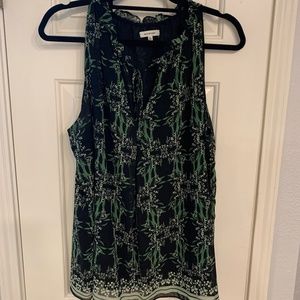 Sleeveless black and green flower blouse